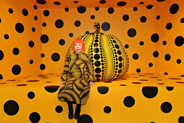 Yayoi Kusama with her installation at the 2010 Aichi Triennale