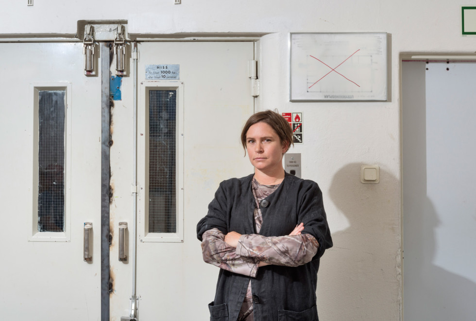 Portrait of Johanna Gustafsson Fürst in front of her work Utrymningsplan, 2015.