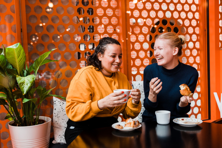 Two girls having coffee.