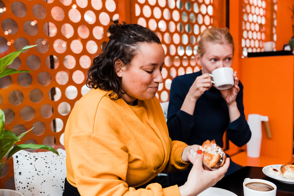 Two girls having coffee.