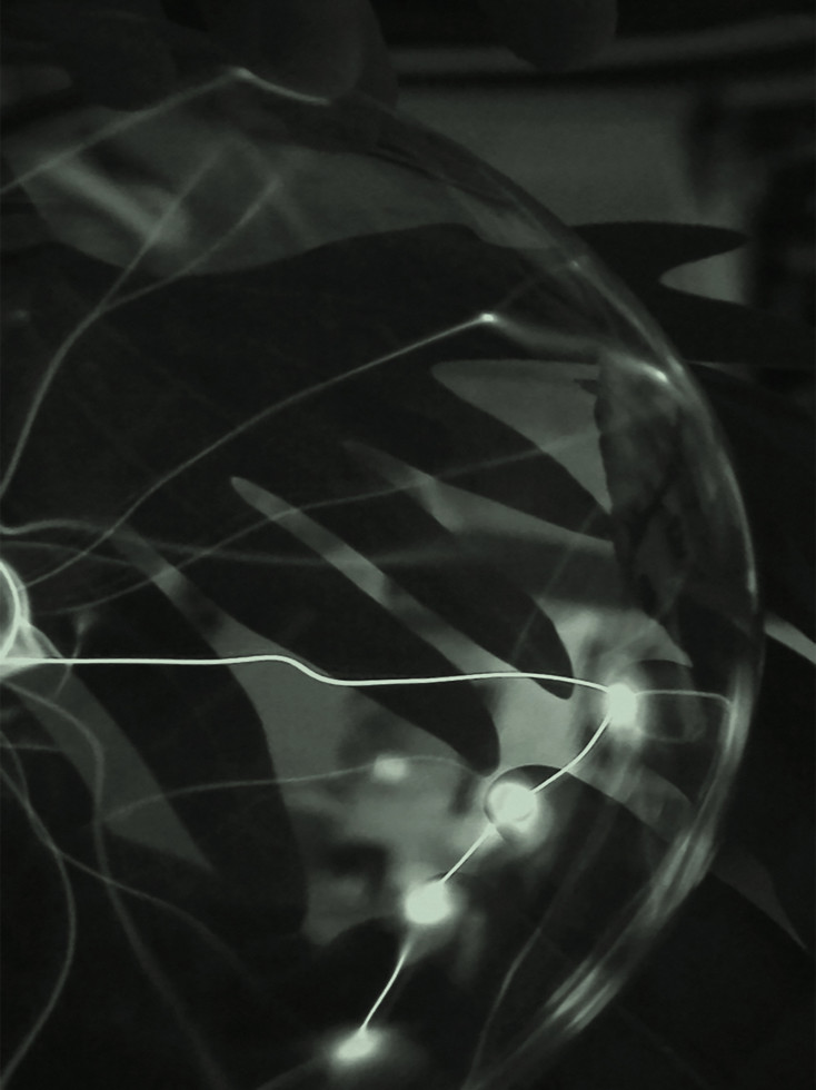 Still from video with light lines and forms.