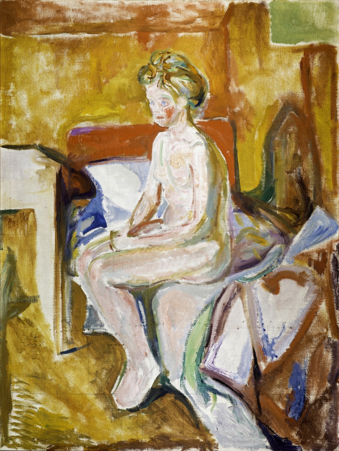 Nude girl sitting on bed