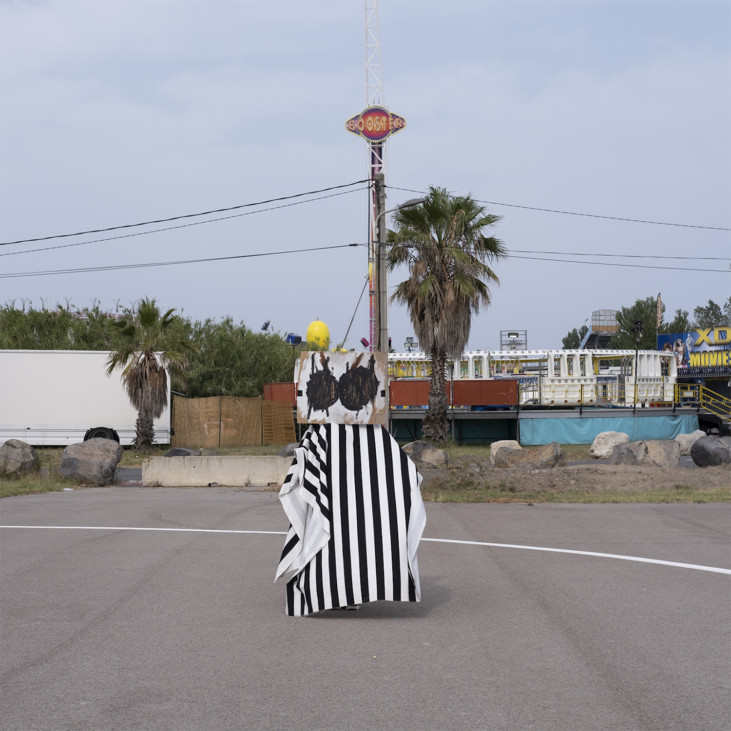 Photo of masked person in street