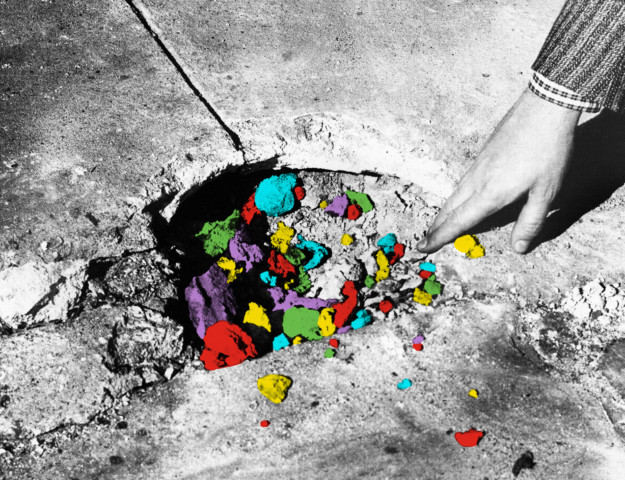 Photo of colored items in a hole