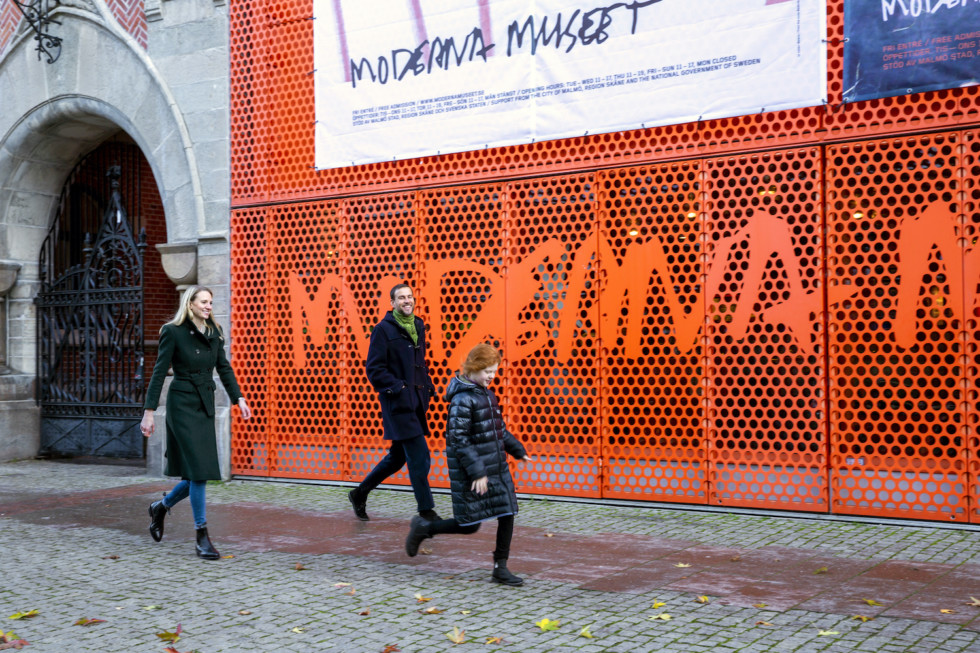 People walking outside building