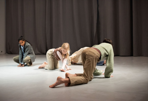 four children in dance performance