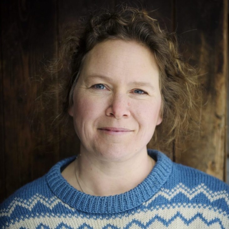 photo of woman in knitted sweater