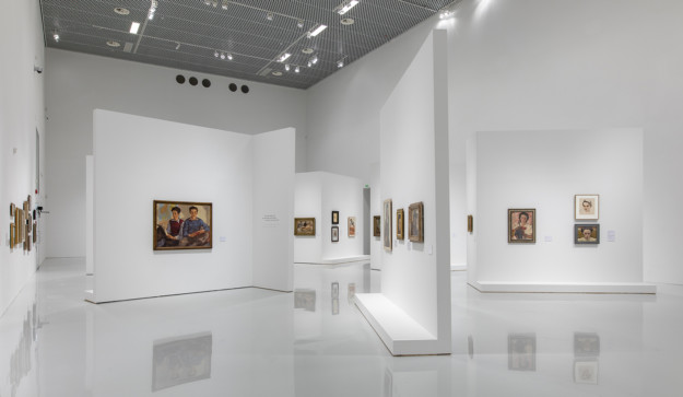 photo of exhibition with paintings