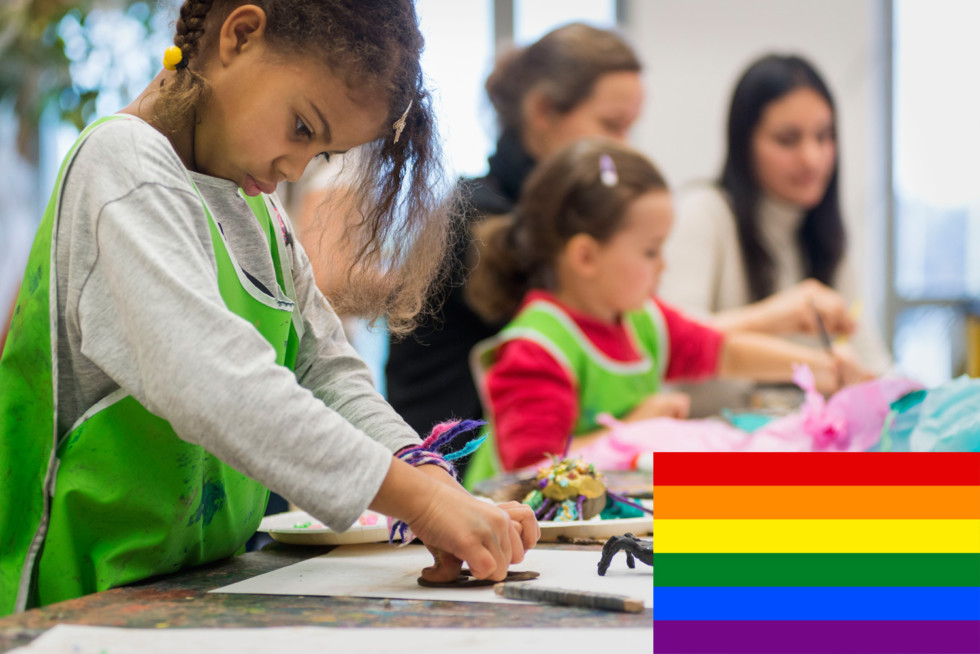 photo of kids in workshop with pride flag attached