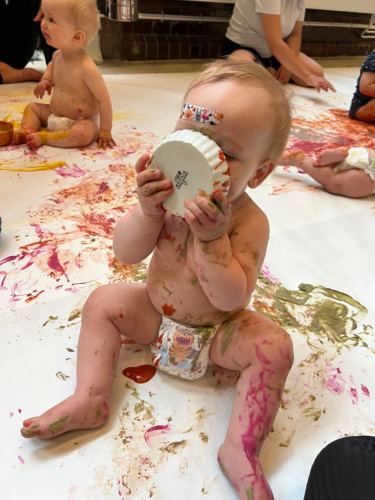 babies painting and eating paint