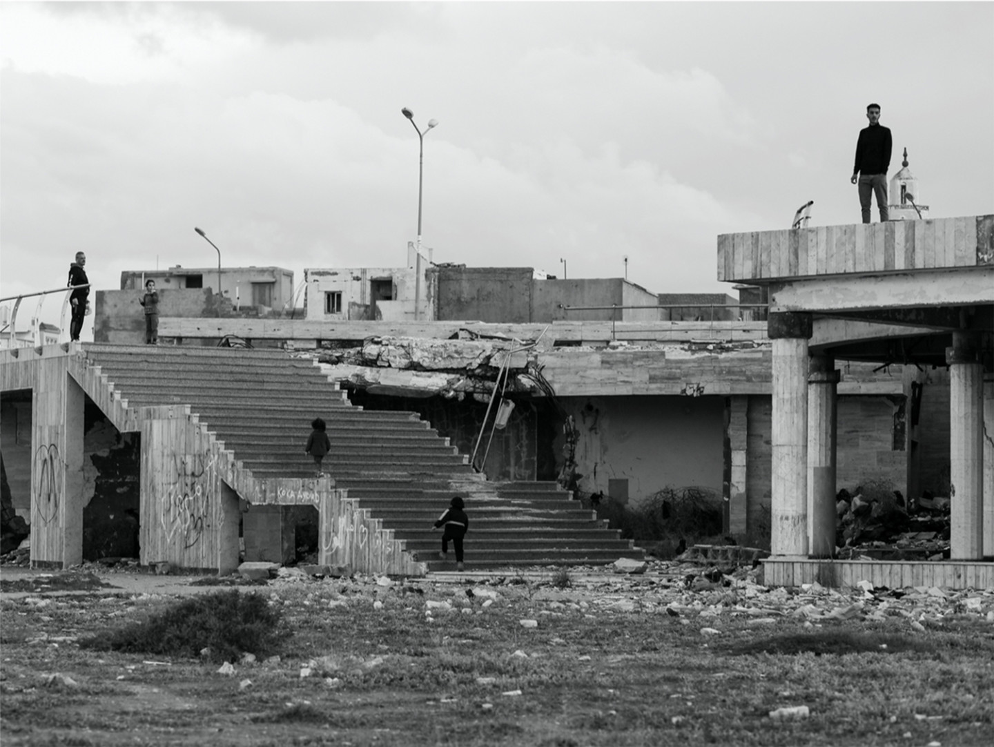 photo of building with stairs and people