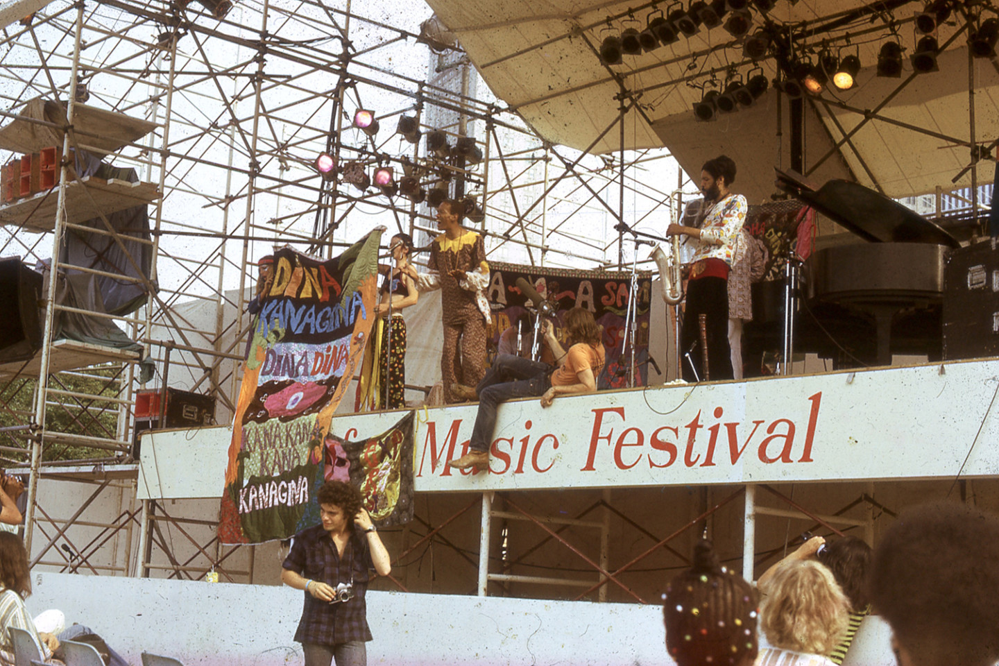 photo of outdoor stage with some people