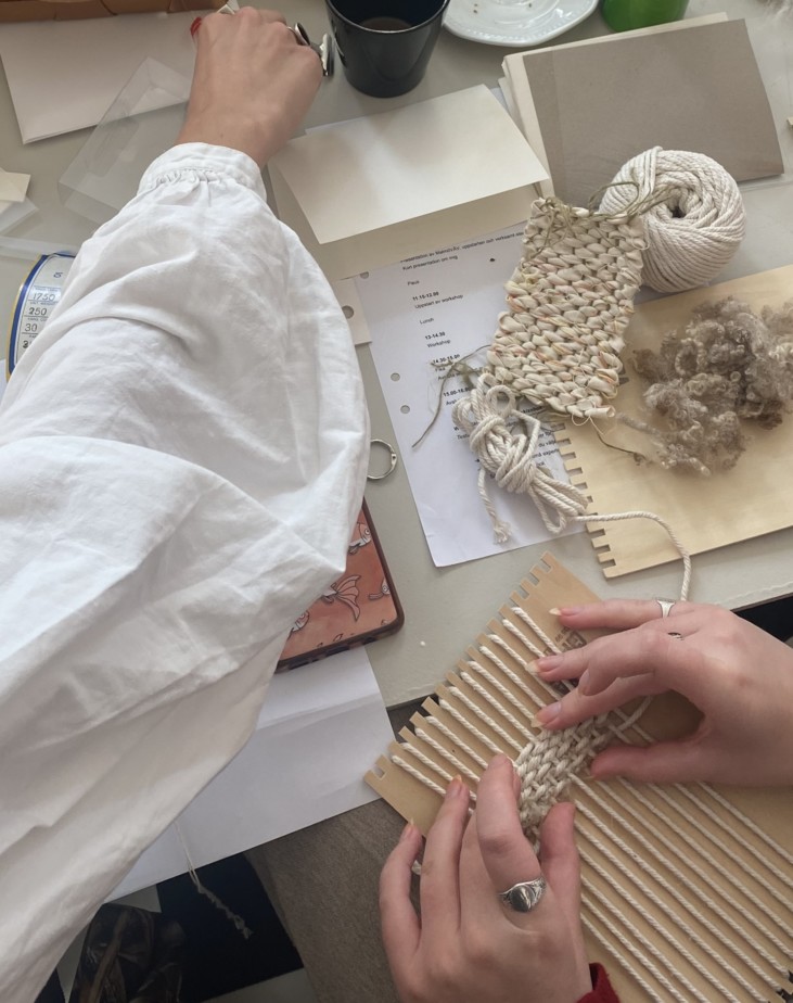 hands working with textile material