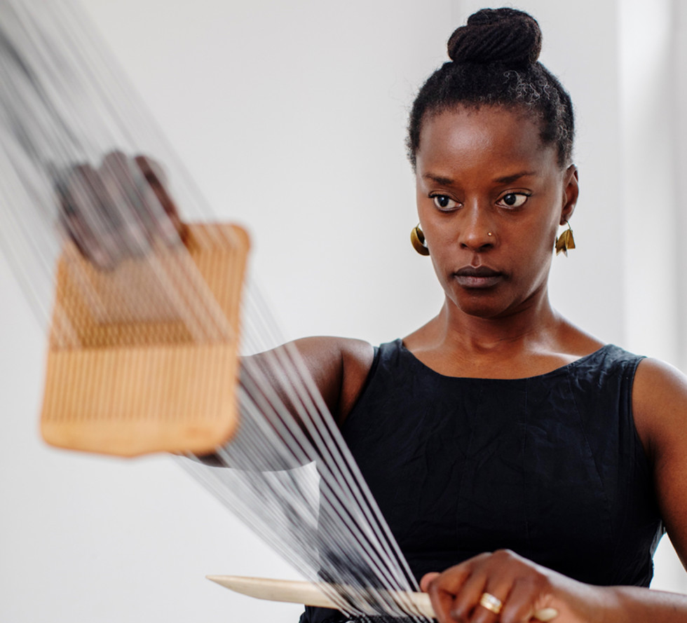 photo of woman weaving