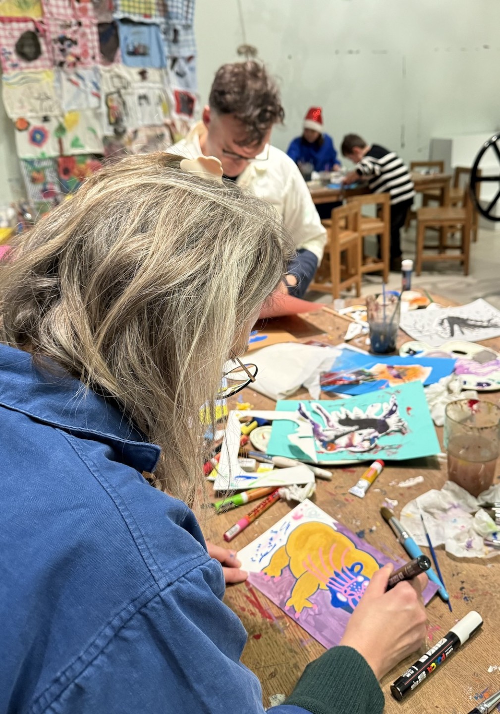 people creating in workshop
