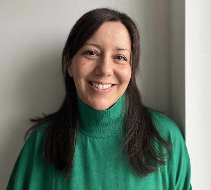 photo of woman in green sweater