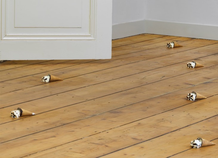 photo of floor with ice cream cones spread over