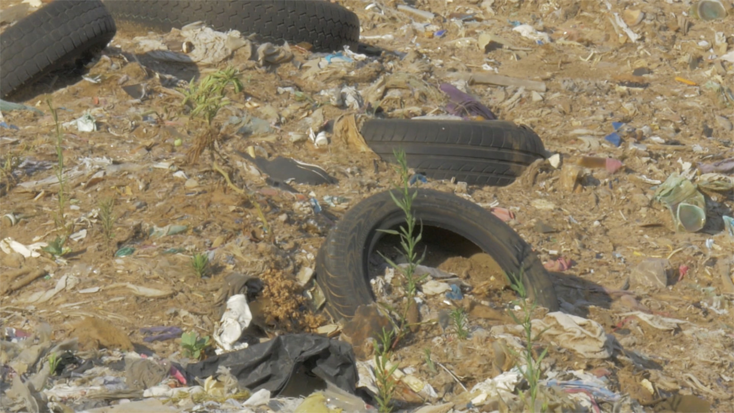 photo of tires and rubbisch on ground