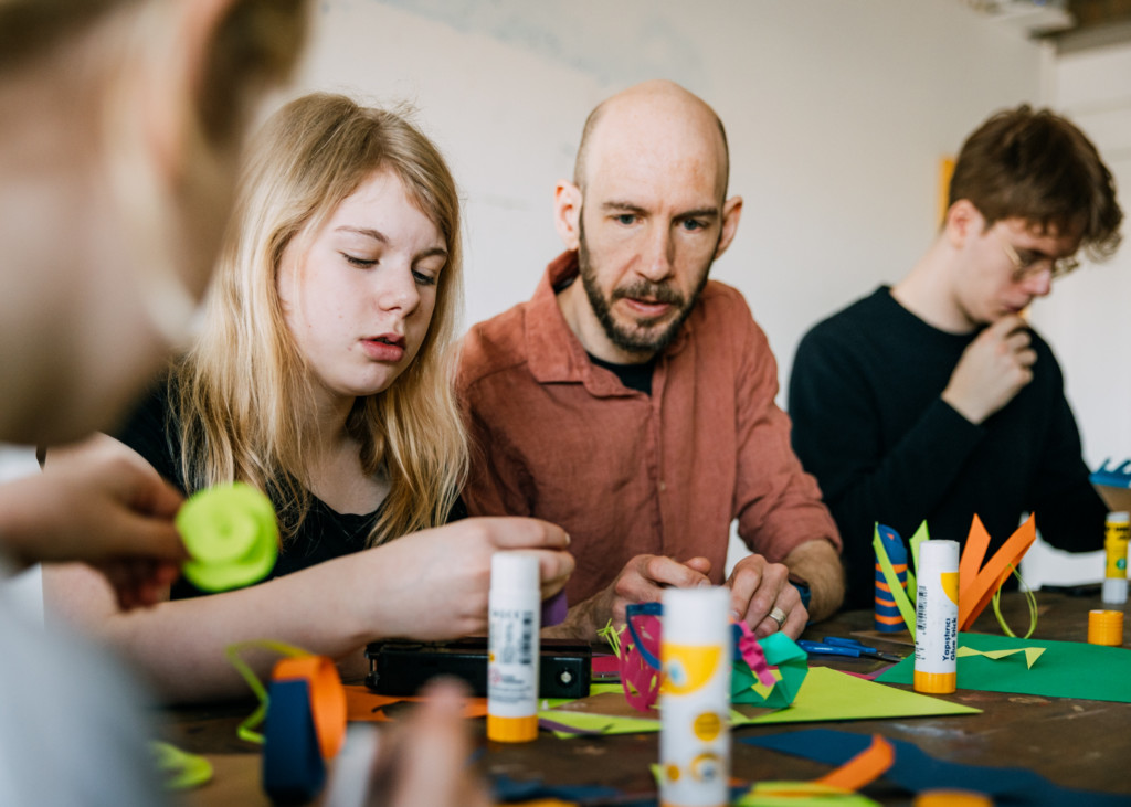 people focusing on creative work