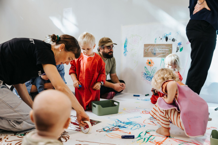 children and adults creating