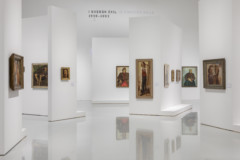 photo of exhibition room with paintings