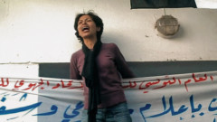 still from video with screaming woman