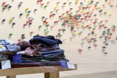 pile of clothes and threads