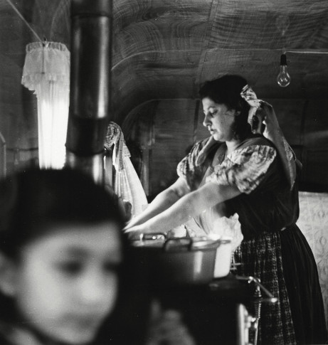 No title. From the series Gipsy Road 1954-55. Stina Taikon cooking for her children in her caravan