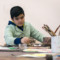 Child paints in the workshop