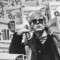 Andy Warhol in front of Brillo Boxes