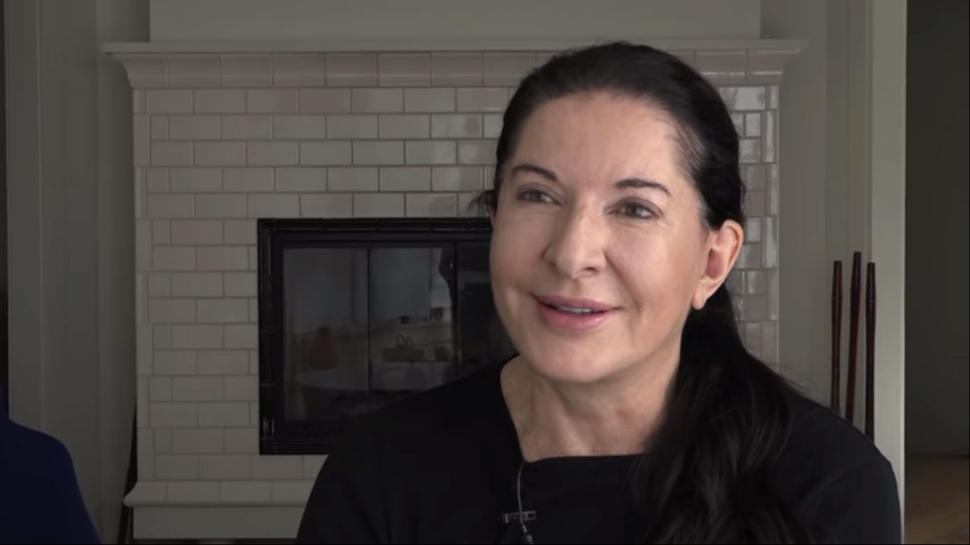 Marina Abramović's face in a home environment.