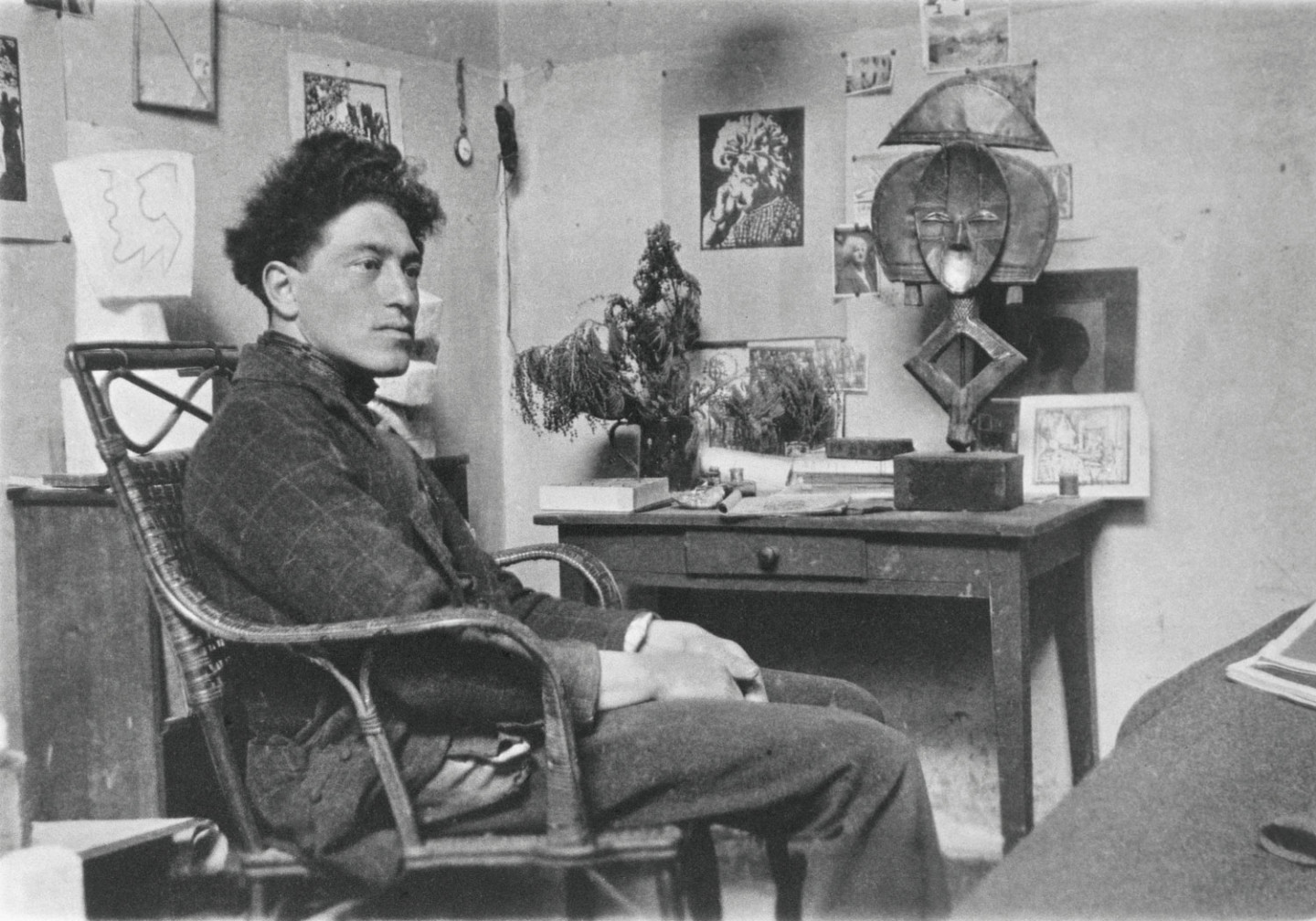 Man sitting on a chair in a studio interior