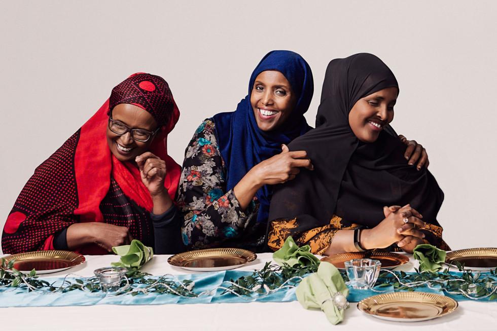 Three women at a set table