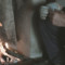 A person is sitting in front of a fire.