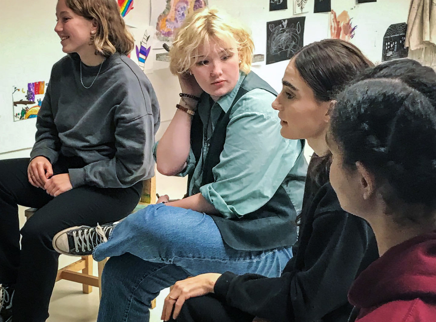 Picture of a group of young people sitting in a room