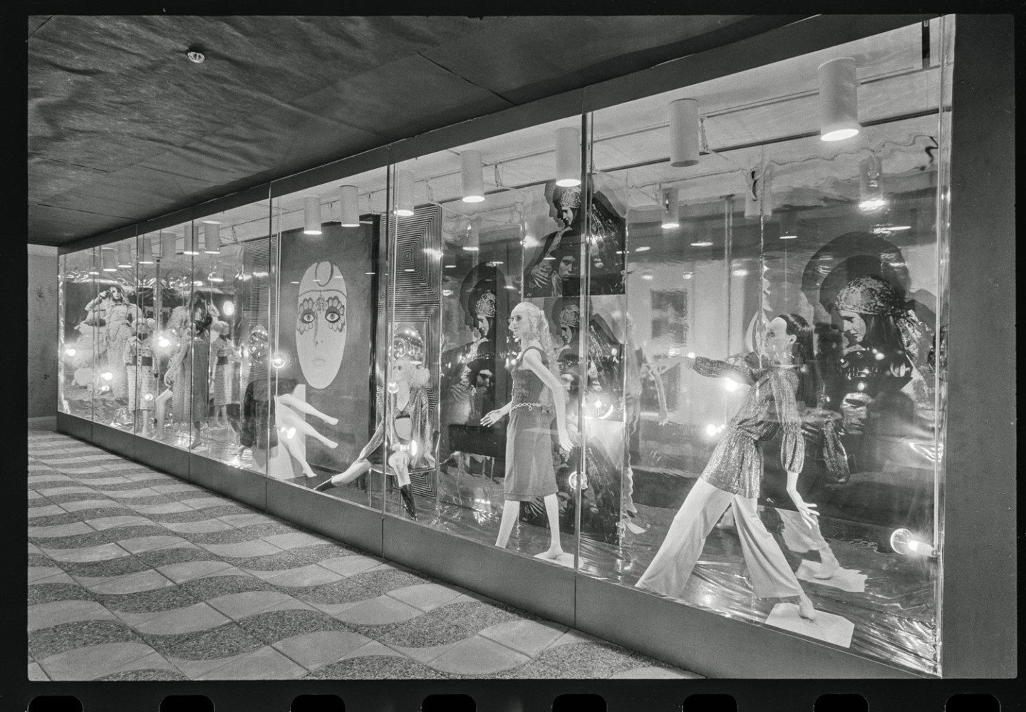 Consumer in infinity. Black and white image on the shopping street that the artwork consisted of.