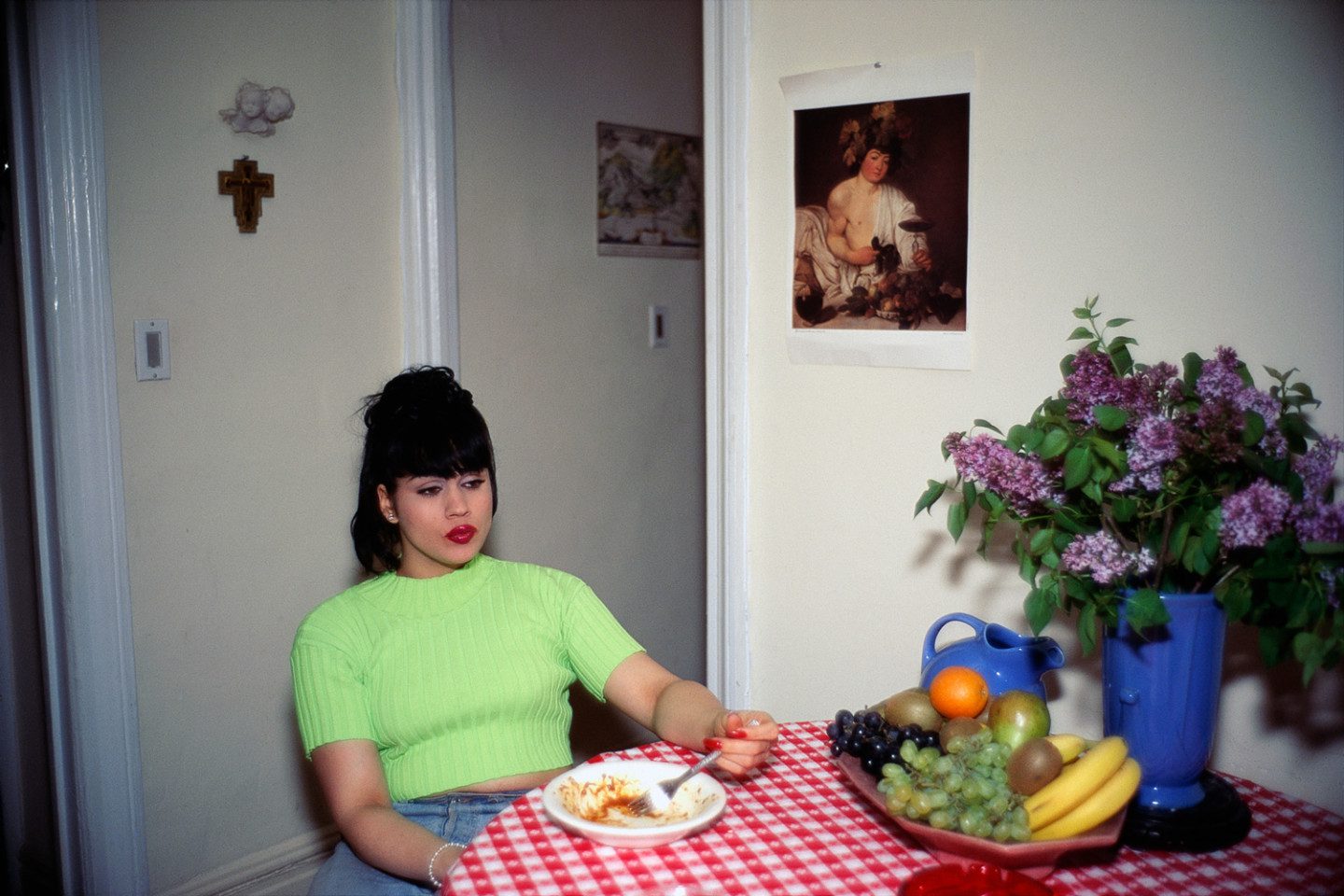 A woman at a kitchen table