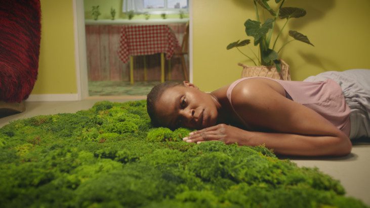  A person on a carpet of moss