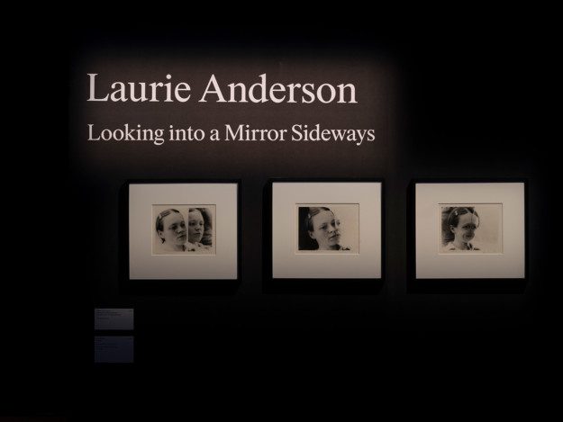 Exhibition view with photo series Absent in the Present: Looking into a Mirror Sideways