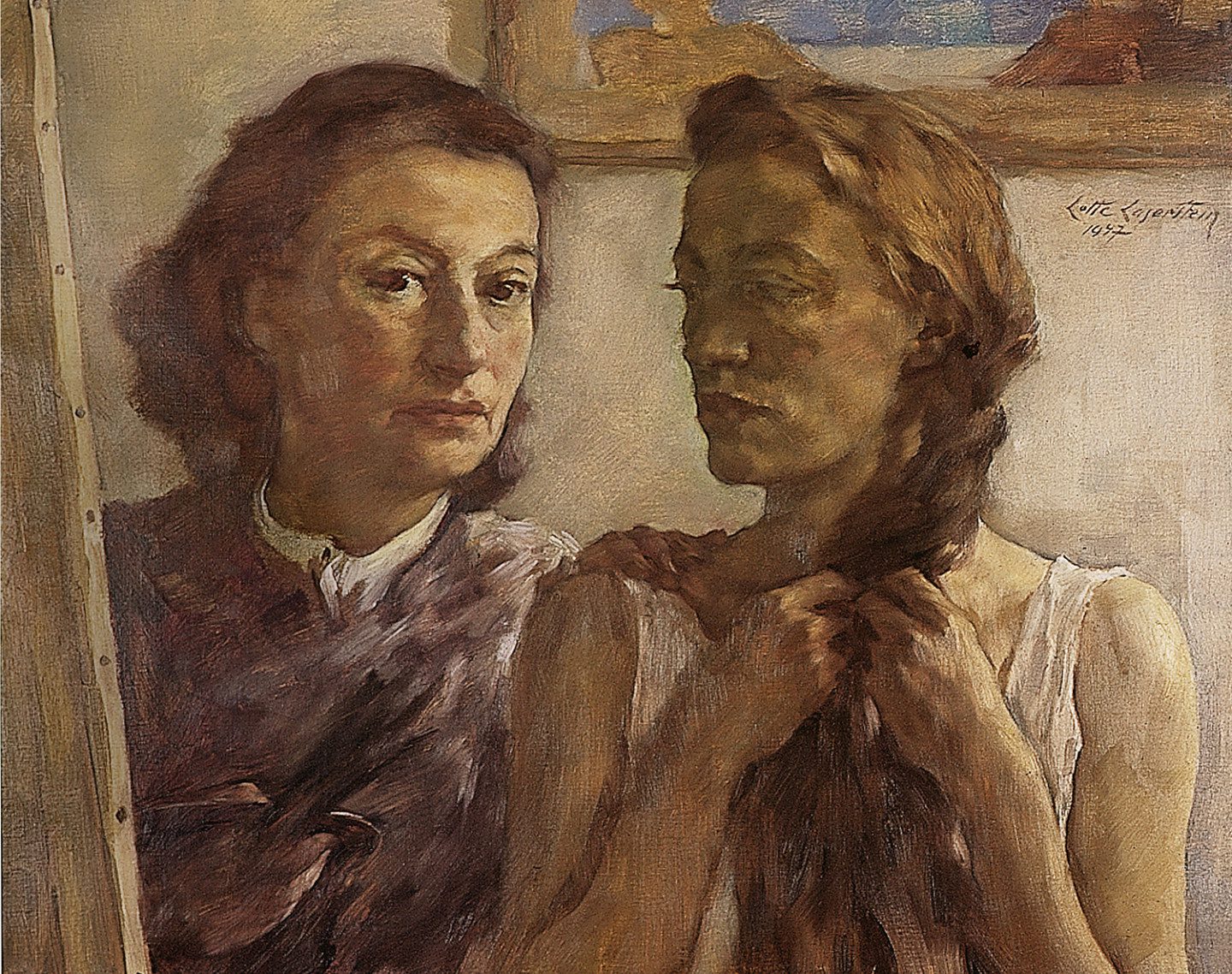 two women and one with palette in hand