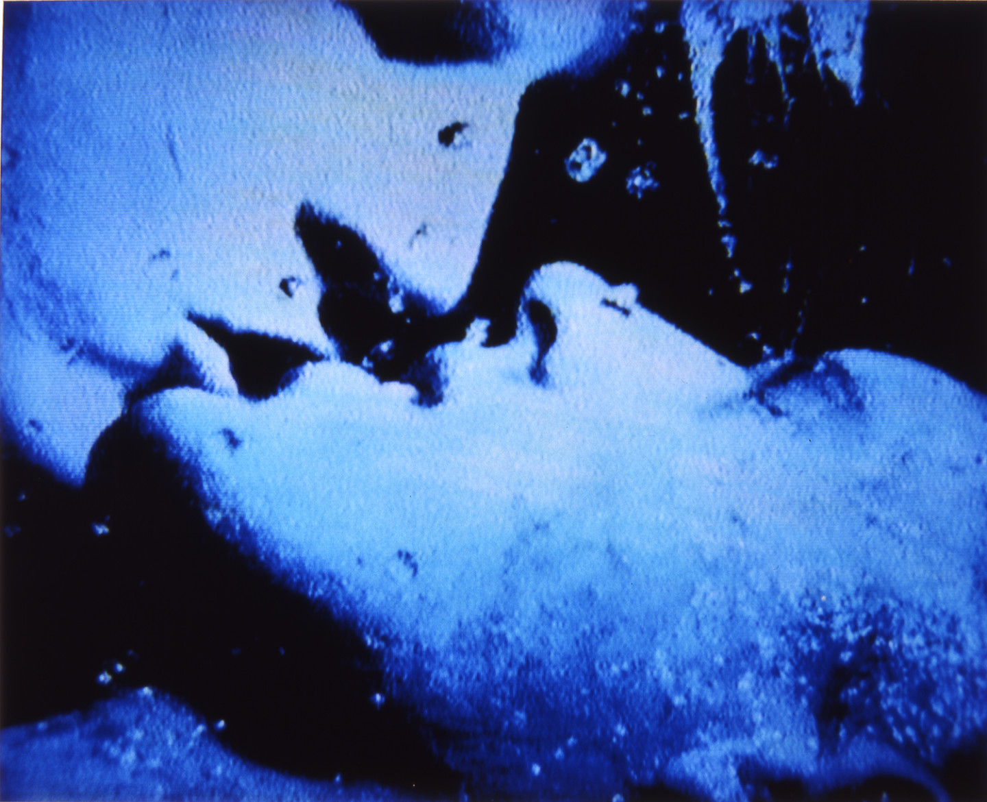 Two persons kissing