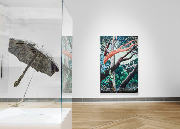 exhibition room with painting and object