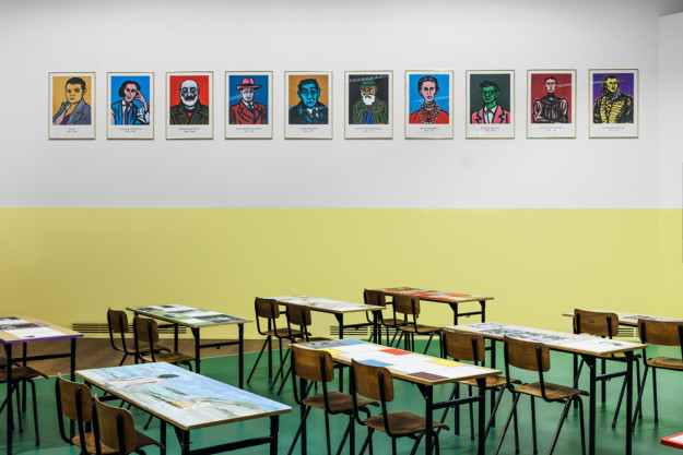 Classroom with a colorful portrait wall